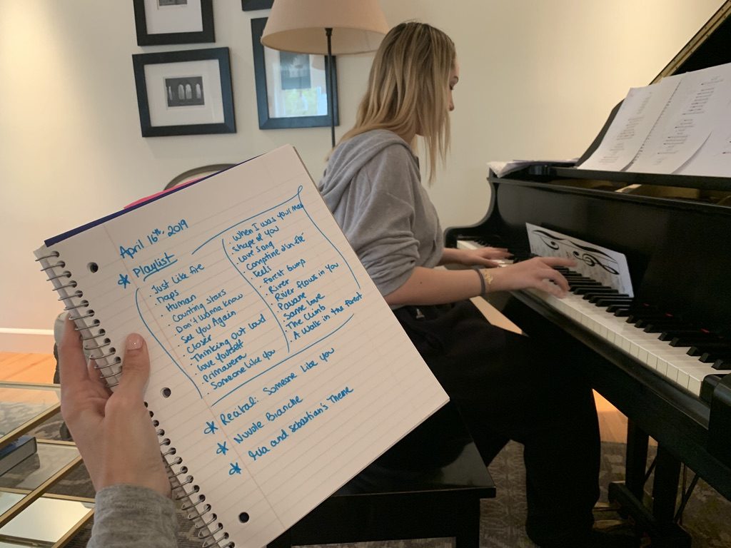 Teenage student practicing their piano playlist