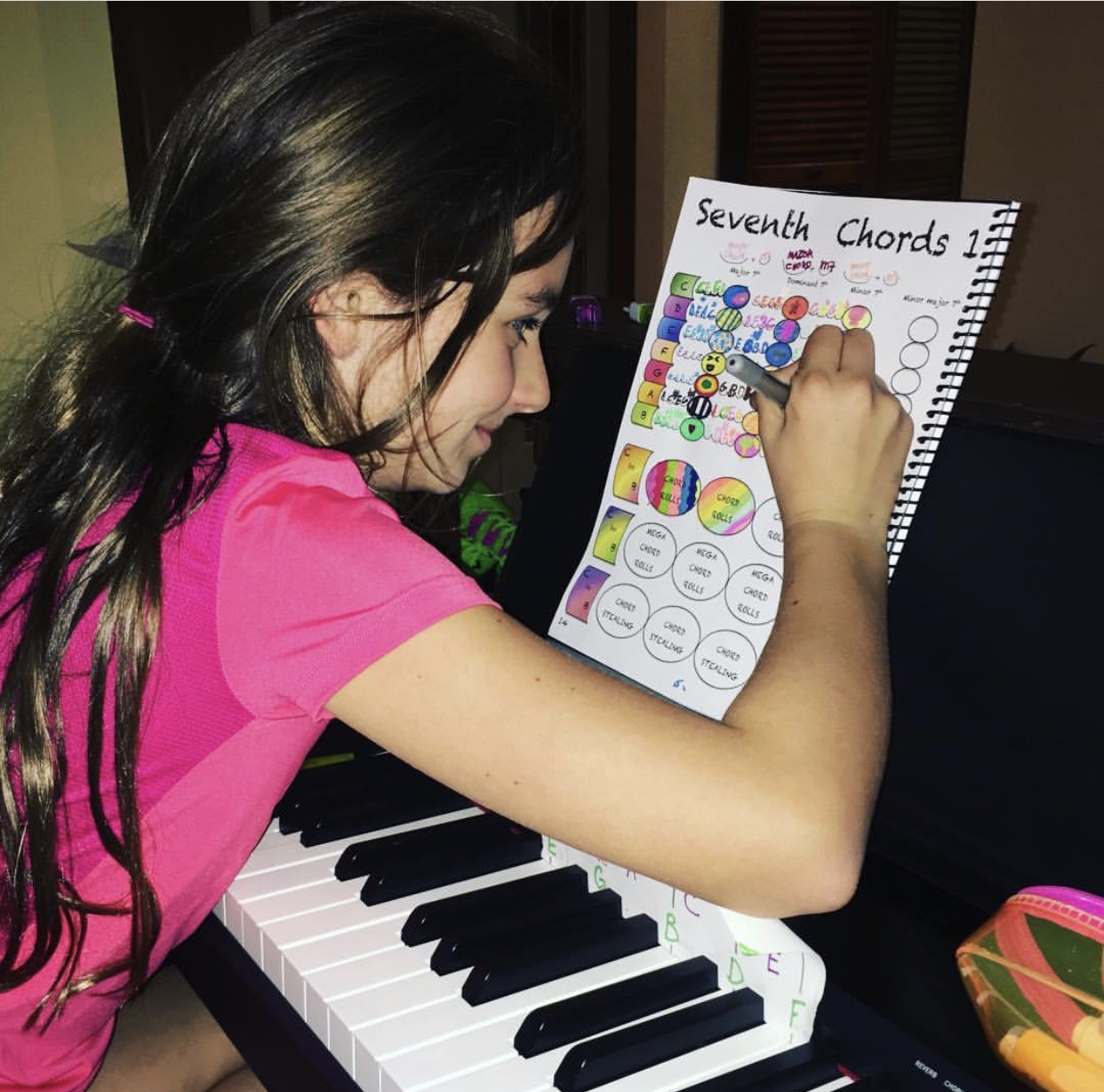 Student using The Cascade Method Piano Theory Book to learn piano 