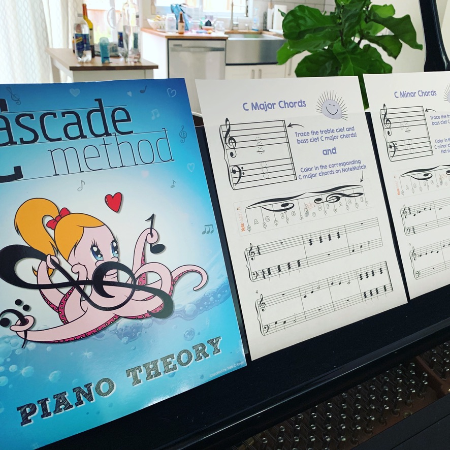 Cascade Method Piano Theory Book displayed on the piano
